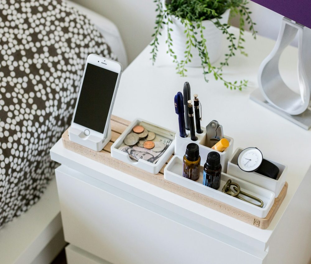 silver iPhone 6 on organizer rack